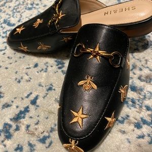 Gold bee black loafers
